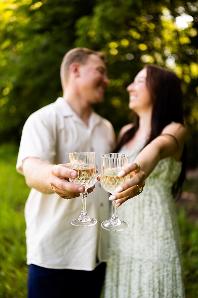 Groom to be proposing during surprise wedding proposal at family home | Emotional reaction during surprise wedding proposal at family home in Missouri | Couple celebrating after surprise wedding proposal at family home | Portraits of newly engaged couple after surprise wedding proposal